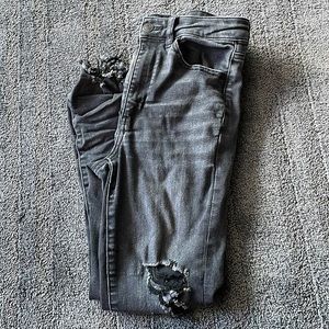 Ripped black ae jeans.